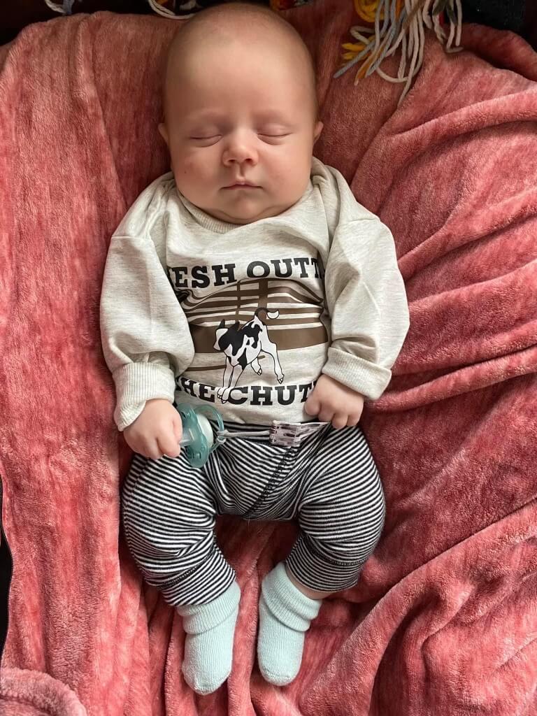 Fresh Outta The Chute. Baby laying asleep